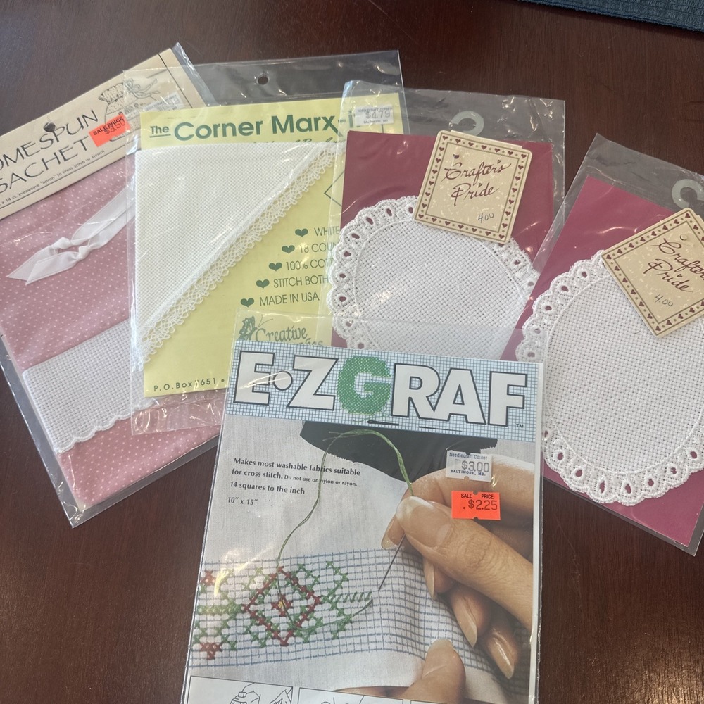 Lot of eight counted Crosstitch projects, bookmark, doilies, pouches, sachet